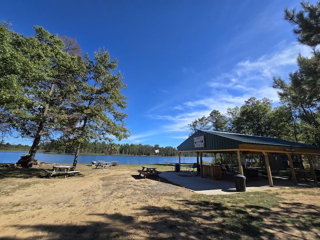 view of home's community with a water view