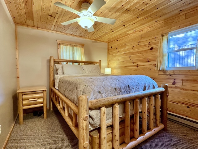 bedroom with a ceiling fan, wooden ceiling, wooden walls, and carpet
