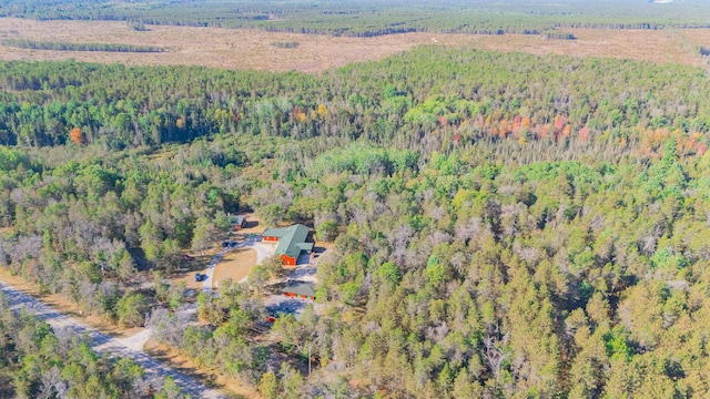 bird's eye view featuring a view of trees