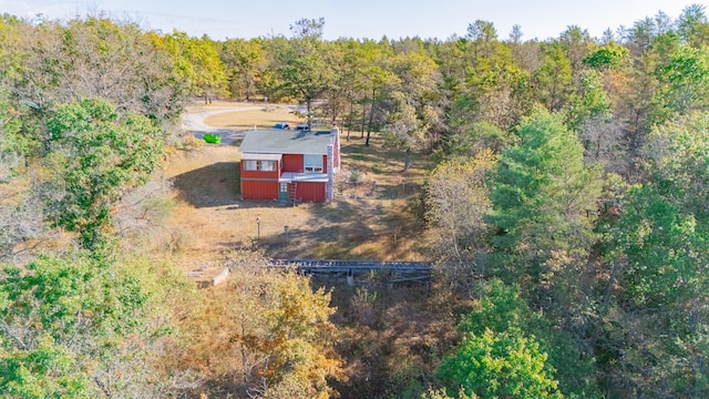 bird's eye view featuring a forest view