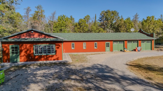 view of front of house featuring driveway and a garage