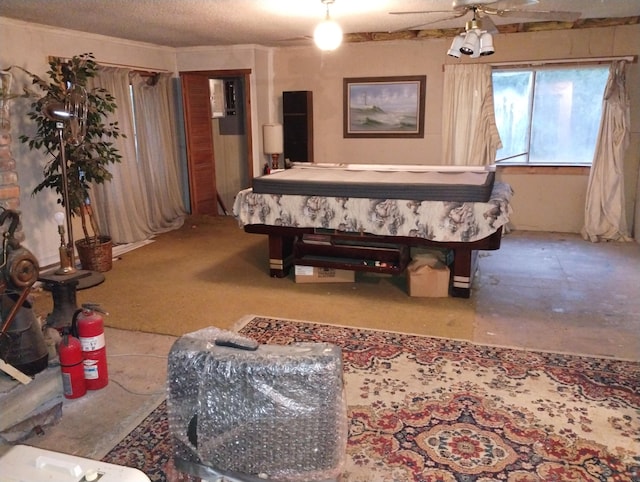 playroom featuring pool table and a textured ceiling