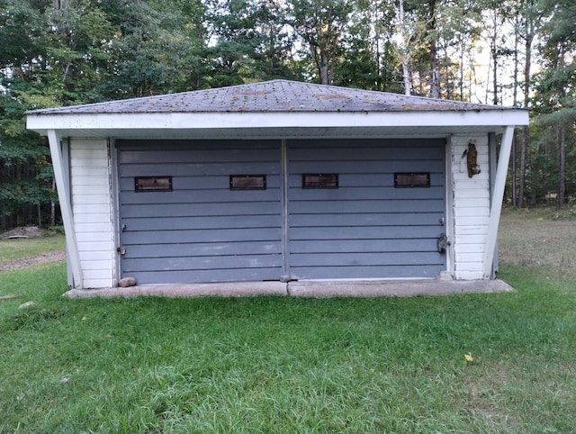 garage featuring a storage unit