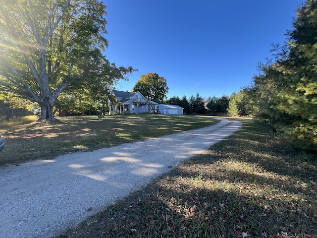 view of road featuring driveway