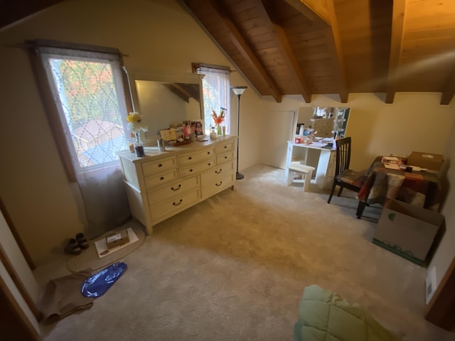 kitchen with lofted ceiling with beams, light carpet, wood ceiling, and light countertops