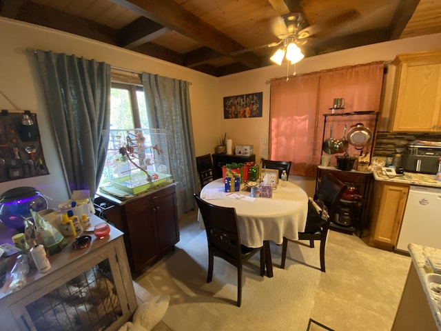 dining space featuring beamed ceiling, wood ceiling, and ceiling fan