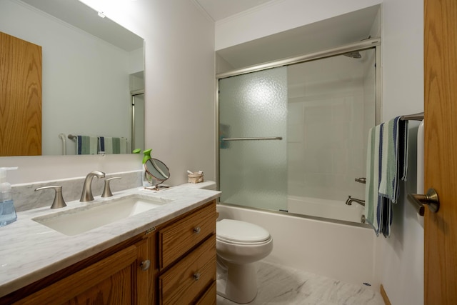 full bathroom featuring enclosed tub / shower combo, toilet, vanity, and crown molding