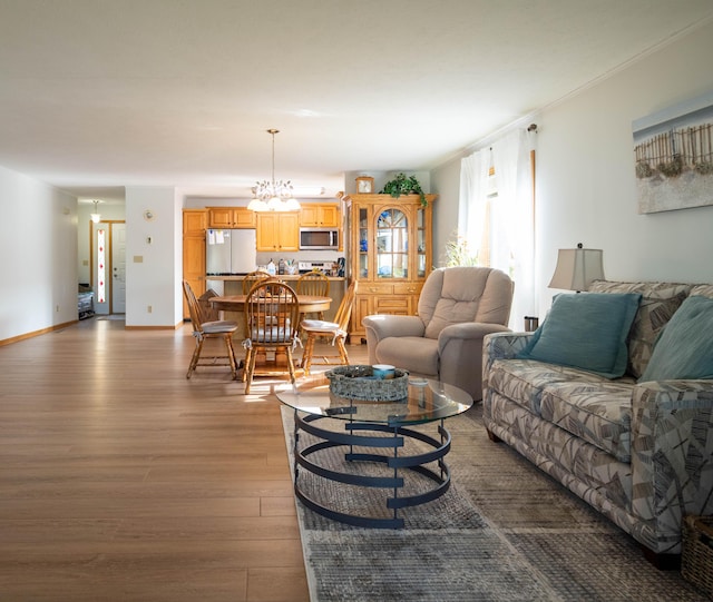 living room with baseboards and dark wood-style flooring