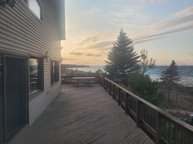 deck at dusk with a water view