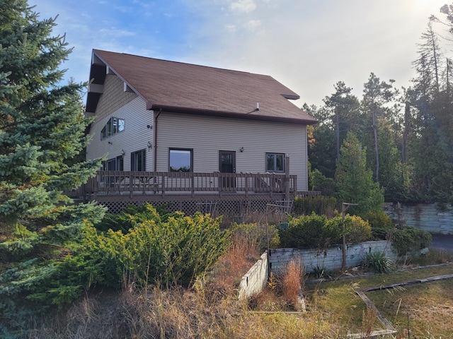 rear view of house with a deck