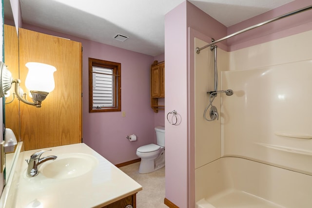 bathroom with visible vents, baseboards, toilet, vanity, and a shower