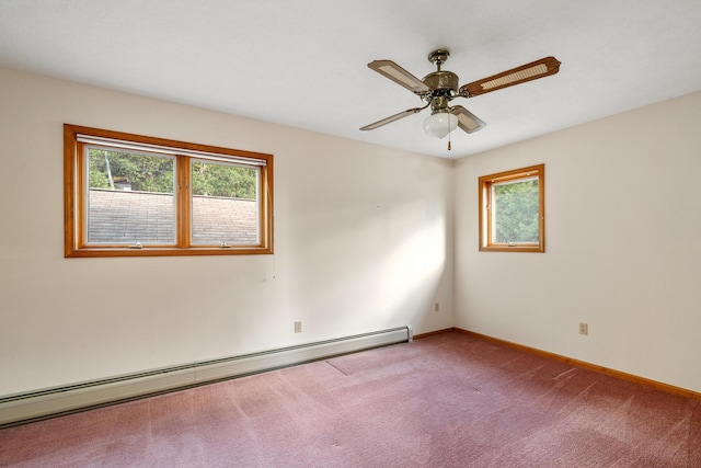 empty room with a baseboard radiator, carpet floors, baseboards, and ceiling fan