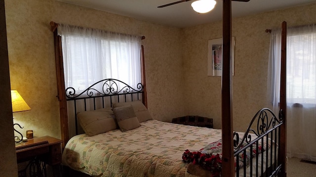 bedroom featuring visible vents and ceiling fan