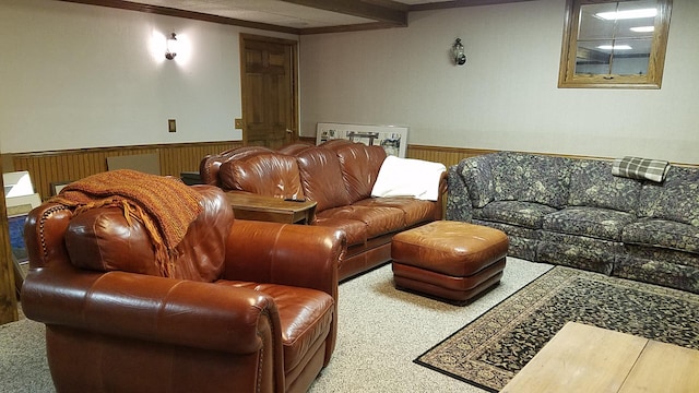 living area featuring a wainscoted wall and wood walls