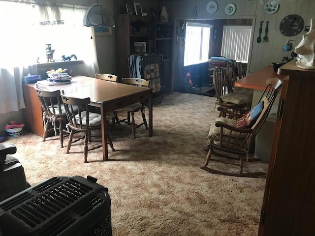 view of carpeted dining area