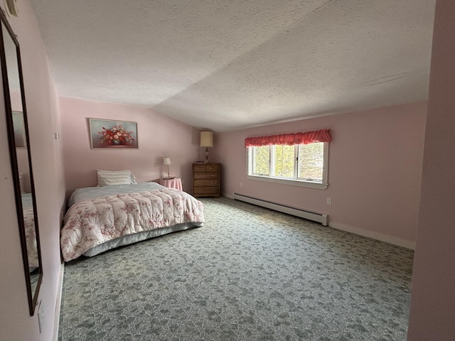 6658 M-33, Onaway, MI 49765 - bedroom featuring baseboards, vaulted ceiling, carpet floors, a textured ceiling, and a baseboard radiator
