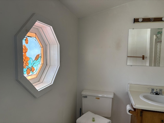 6658 M-33, Onaway, MI 49765 - bathroom featuring toilet and vanity
