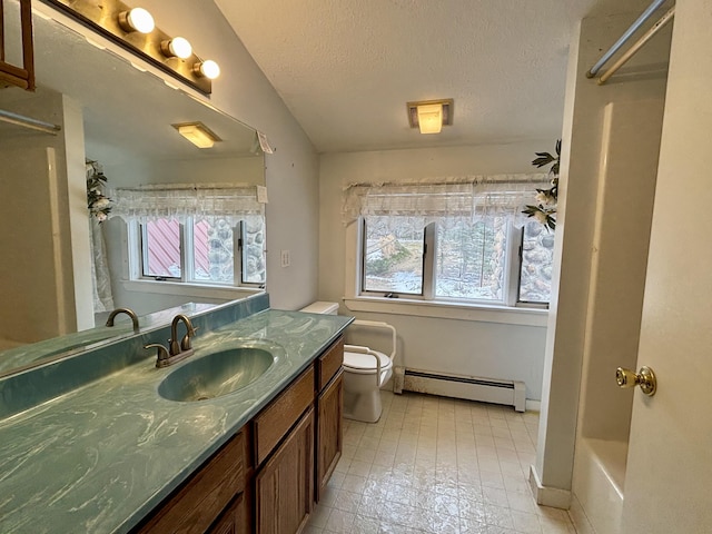 6658 M-33, Onaway, MI 49765 - bathroom featuring toilet, a textured ceiling, a shower with shower curtain, baseboard heating, and vanity