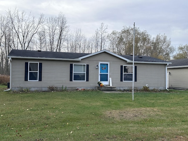 view of front of home with a front lawn