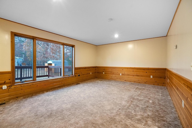 4963 Eastway Dr, Indian River, MI 49749 - unfurnished room featuring wooden walls, recessed lighting, carpet floors, and wainscoting