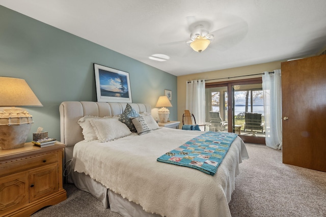 bedroom with ceiling fan, access to exterior, and light carpet