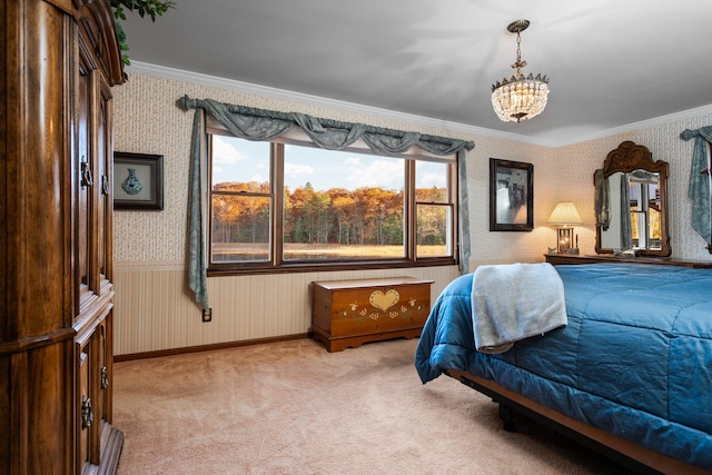 bedroom with baseboards, wallpapered walls, crown molding, and carpet