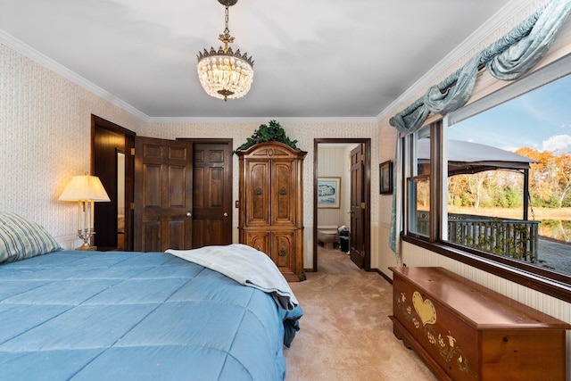 bedroom featuring wallpapered walls, crown molding, a notable chandelier, and light colored carpet