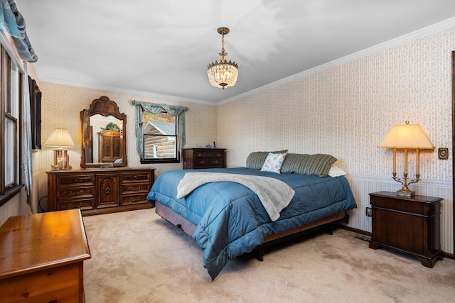 bedroom featuring light carpet, wainscoting, wallpapered walls, and ornamental molding