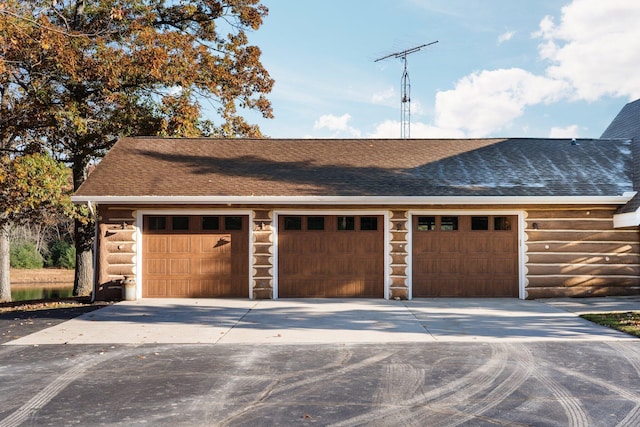 garage with driveway