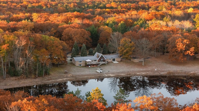 aerial view with a view of trees and a water view