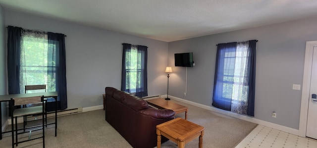 living room featuring baseboards