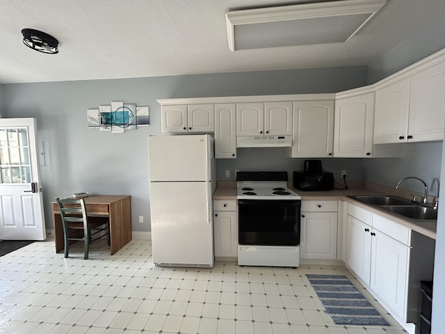 kitchen with electric range, a sink, under cabinet range hood, freestanding refrigerator, and light floors