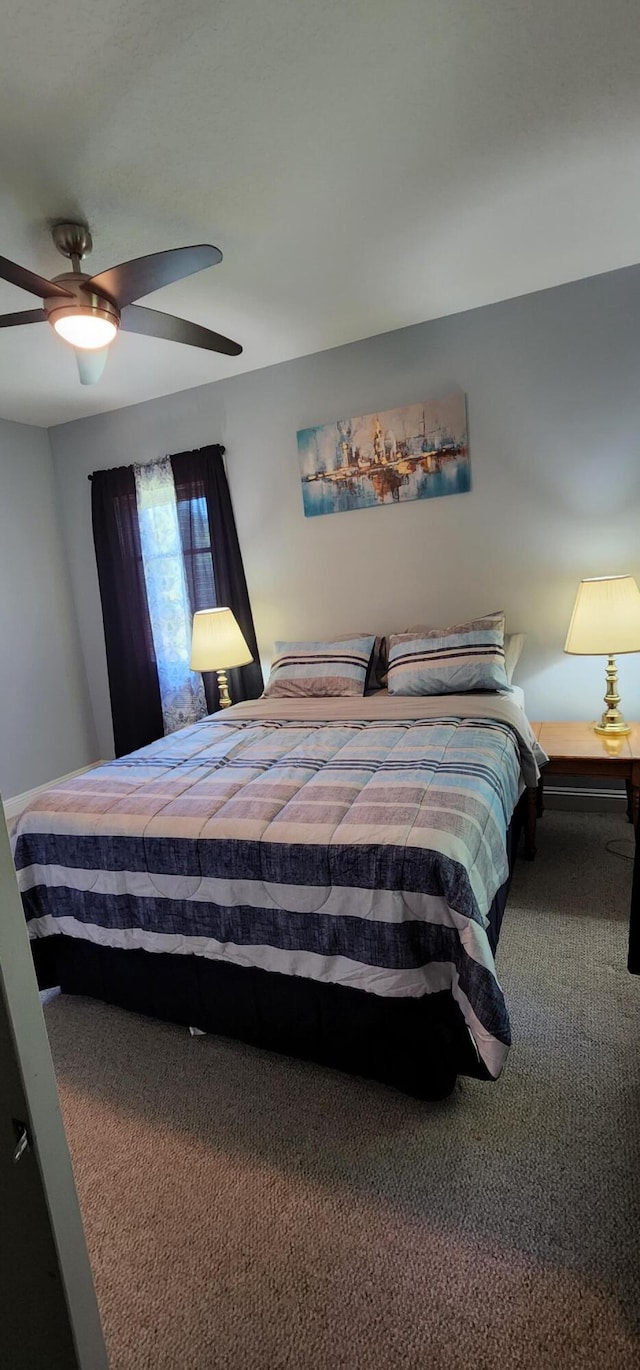 bedroom featuring carpet flooring and a ceiling fan