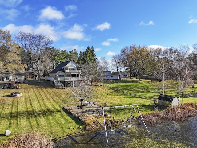 view of yard featuring a rural view and fence