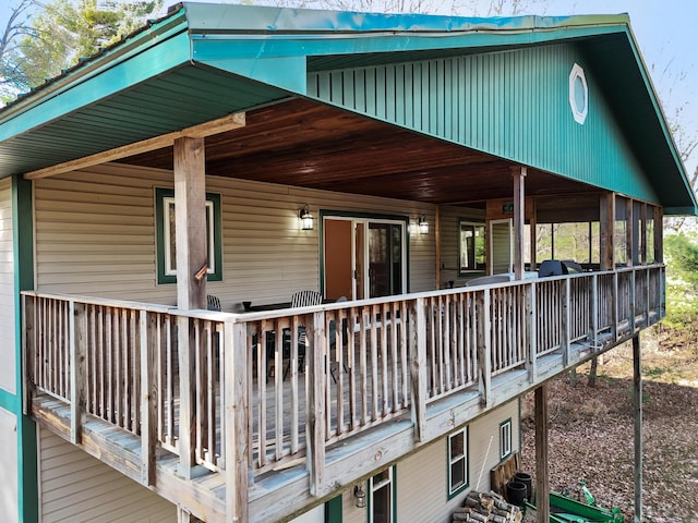 wooden terrace featuring cooling unit