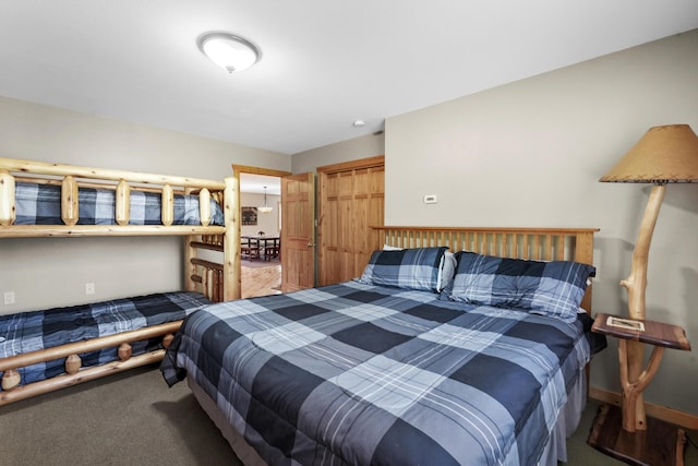 carpeted bedroom featuring a closet