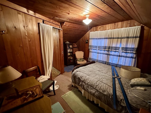 bedroom with wooden ceiling, wooden walls, and lofted ceiling