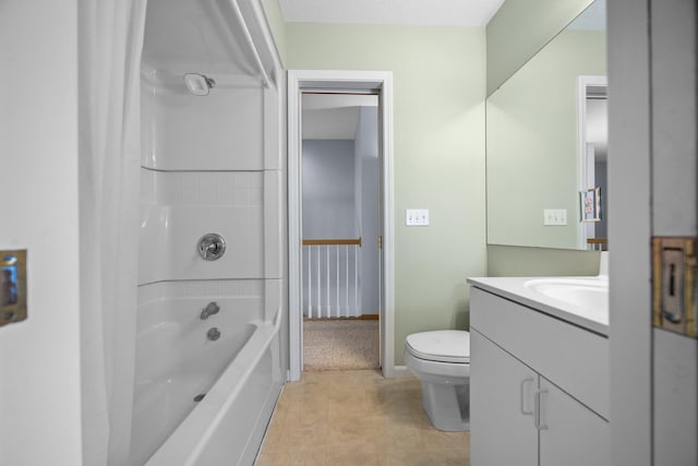 full bathroom with baseboards, toilet, vanity, and  shower combination