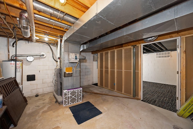 unfinished basement with heating unit and water heater