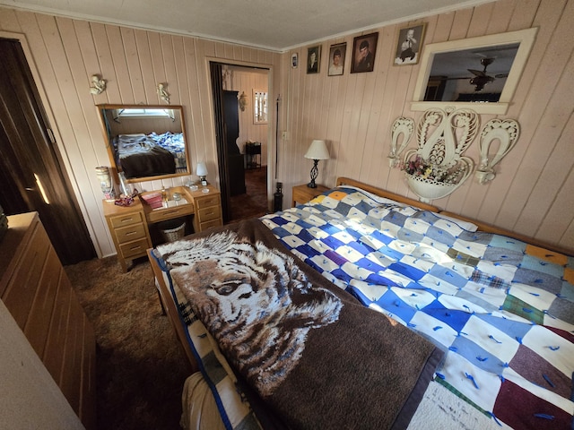 bedroom with carpet flooring and crown molding