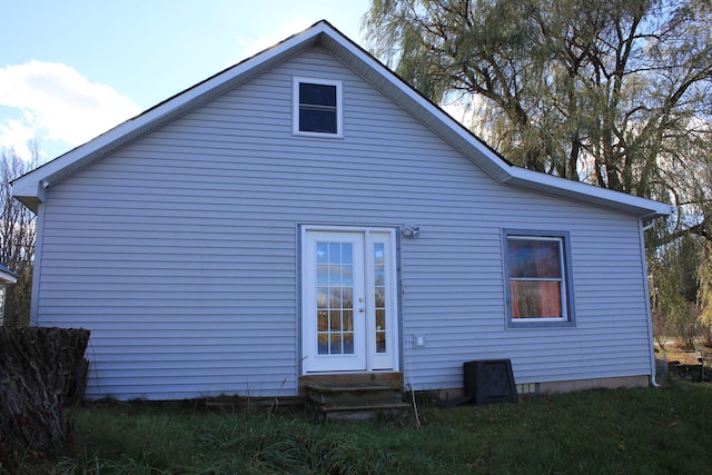 rear view of house with entry steps