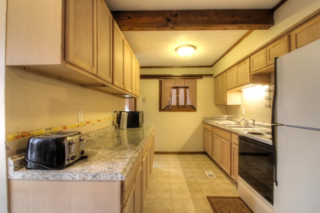 kitchen featuring baseboards, beamed ceiling, light countertops, white appliances, and a sink