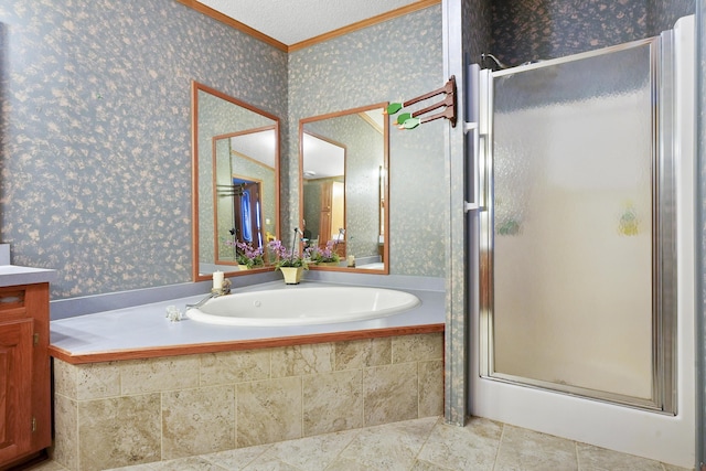 full bath with a textured ceiling, a stall shower, vanity, and wallpapered walls