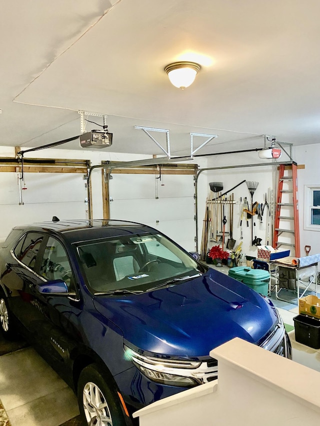 garage featuring a garage door opener