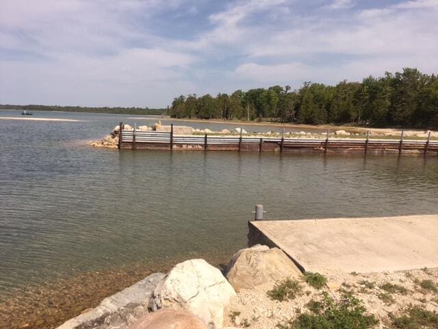 dock area featuring a water view