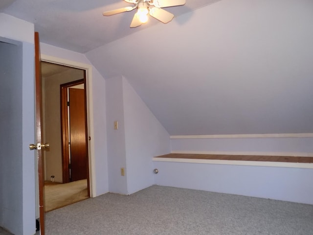 bonus room with carpet flooring, ceiling fan, and lofted ceiling