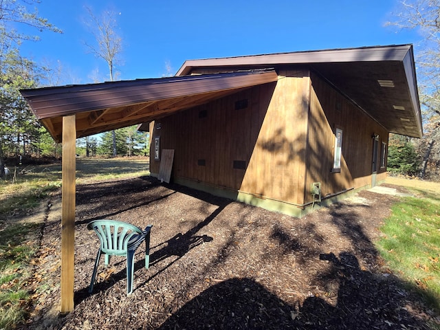 exterior space featuring a carport