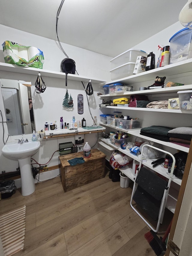 storage room featuring a sink