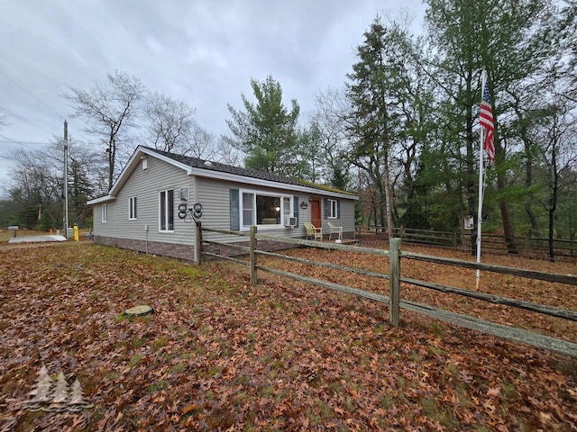 view of front of property with fence