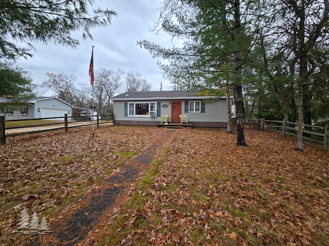 view of front facade featuring fence